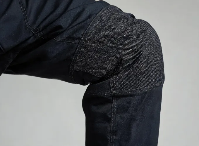 Protective workwear knee panel during movement trial